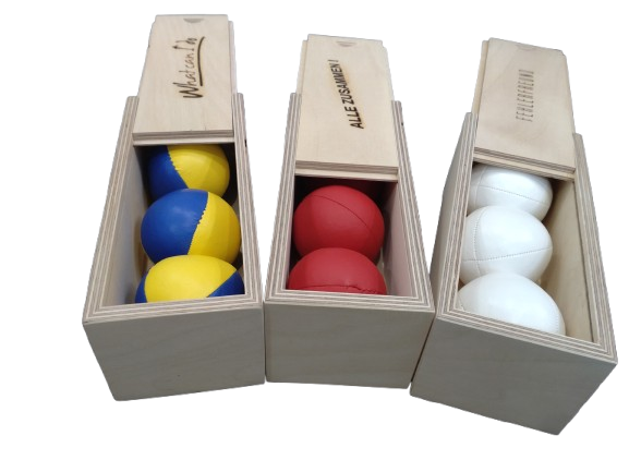Premium juggling gift set in a custom-embossed wooden box by international keynote speaker Andreas Gebhardt